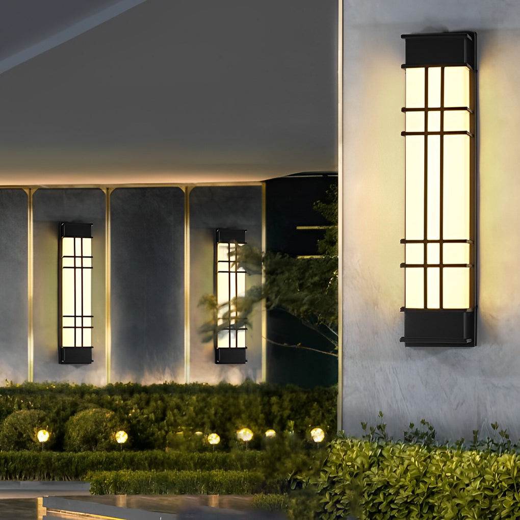Outdoor wall sconce black with sleek design, illuminating a contemporary outdoor space.