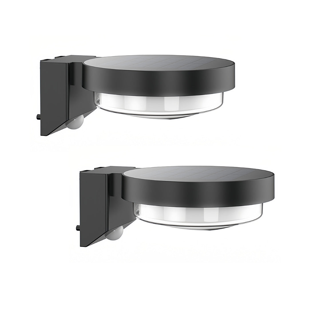 Contemporary outdoor wall sconce in matte black with minimalist circular profile.