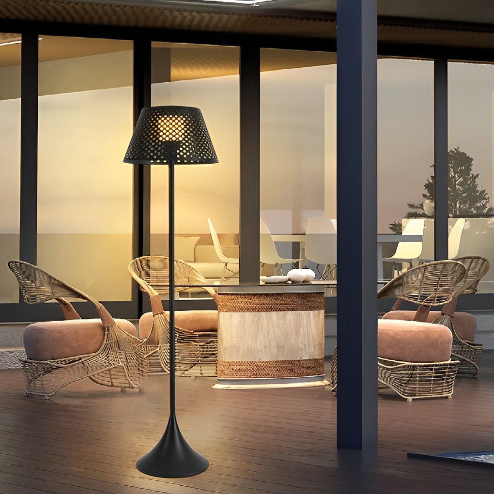 Outdoor waterproof floor lamps used on a covered terrace, blending modern floor lighting with outdoor furniture.