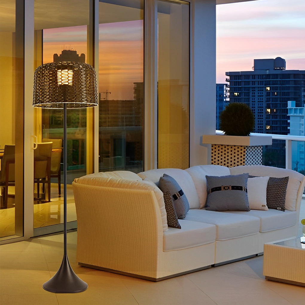 Outdoor waterproof floor lamps enhancing a modern outdoor living room with city view and warm lighting glow.