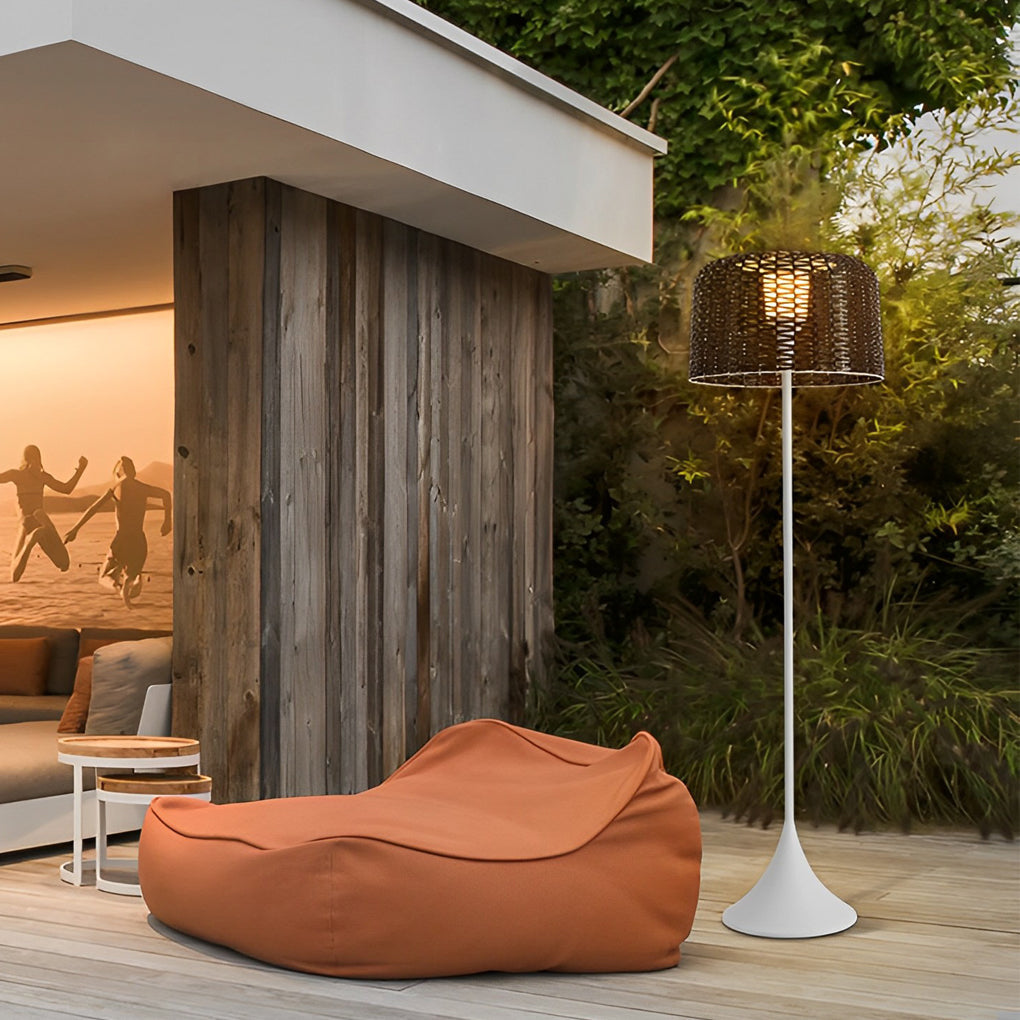 Outdoor waterproof floor lamps near a wooden exterior wall, adding decorative lighting to a garden lounge area.