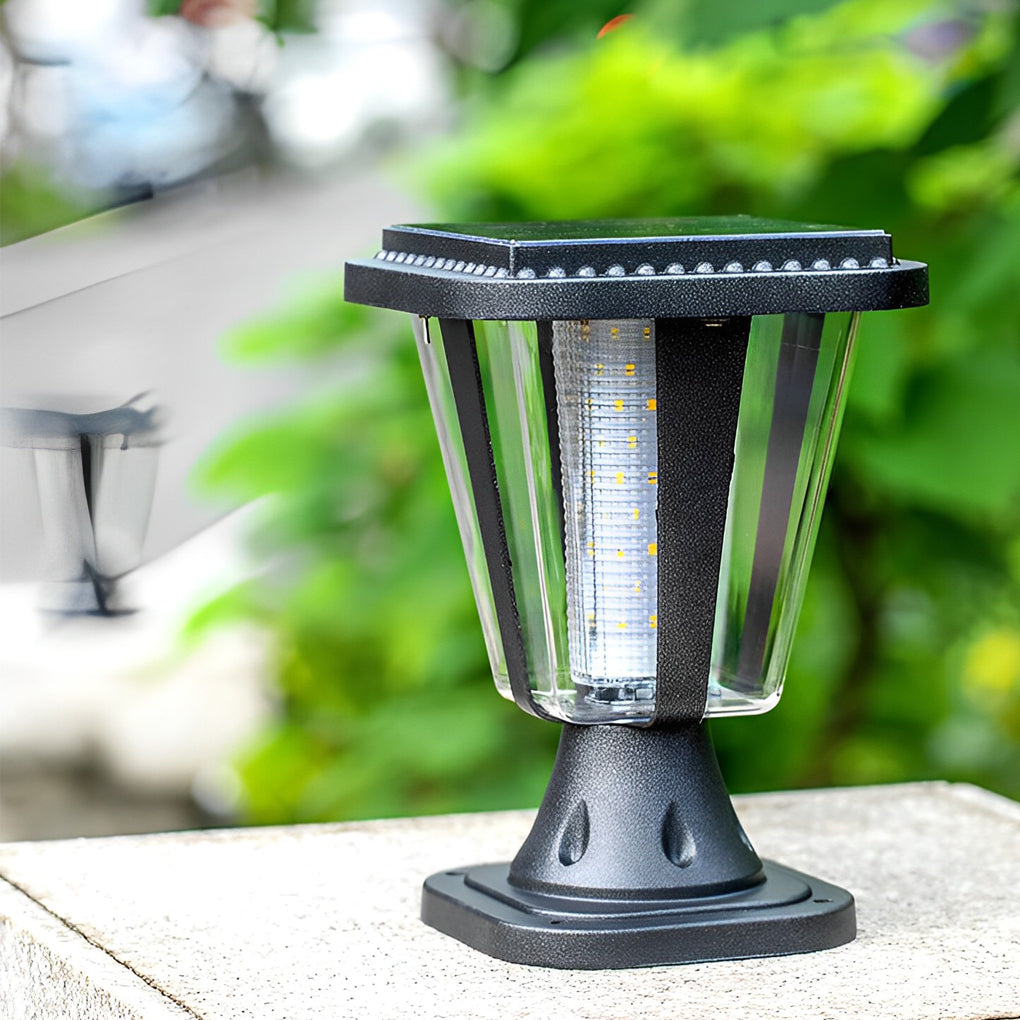 Outdoor waterproof post lamp providing warm light beside a stone pillar.