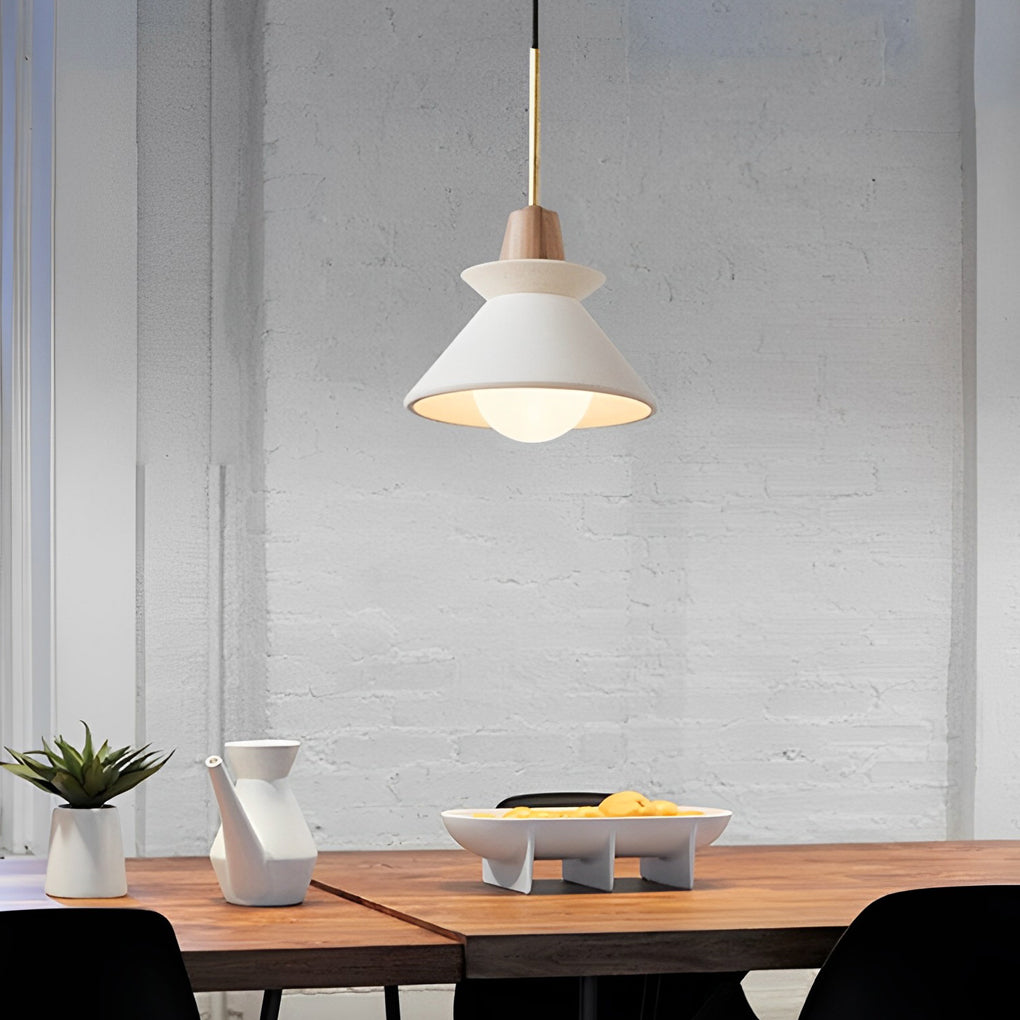 Pair of oval bulkhead lights symmetrically mounted on a concrete exterior wall.