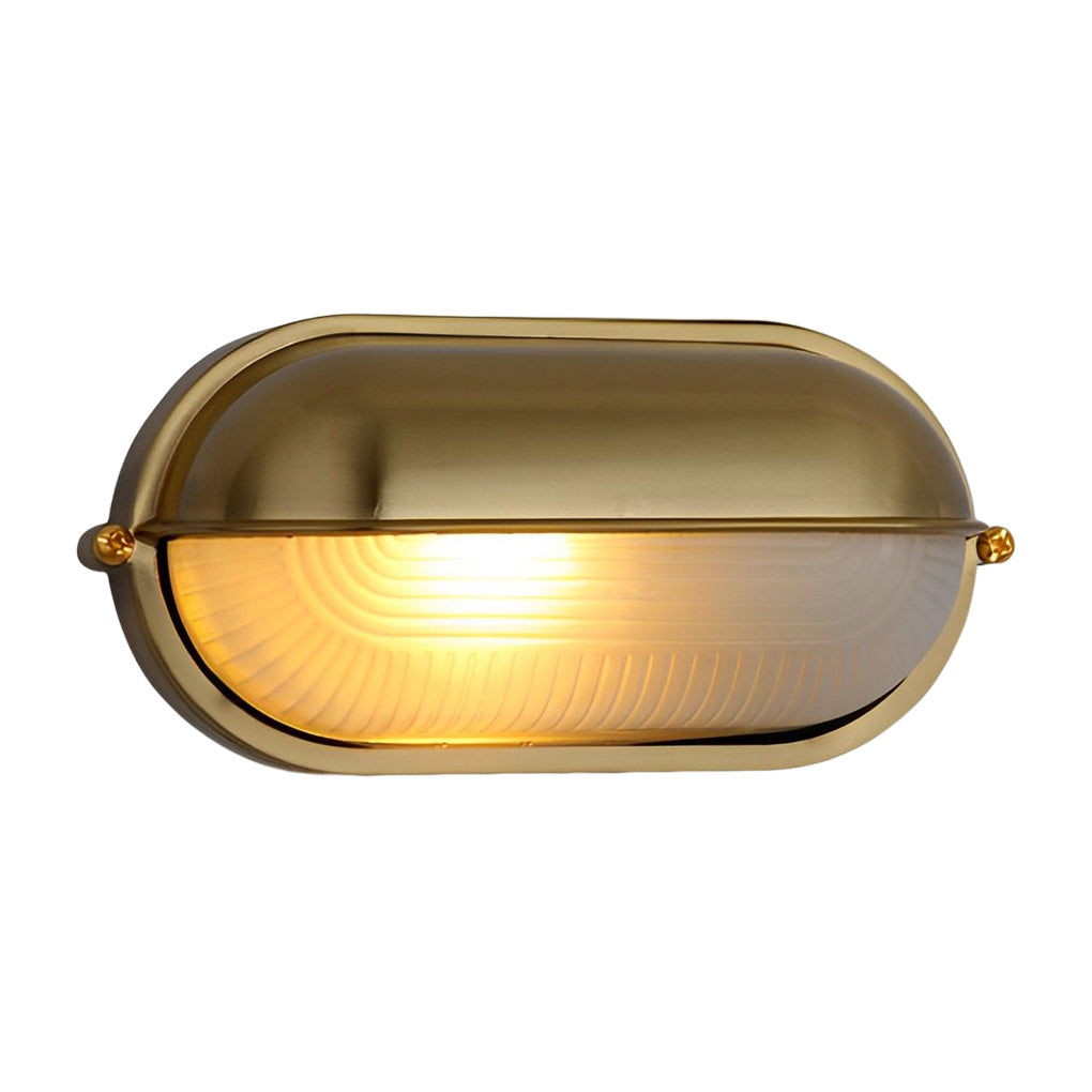 Close-up of an oval bulkhead light diffuser showing detailed ribbed glass texture.
