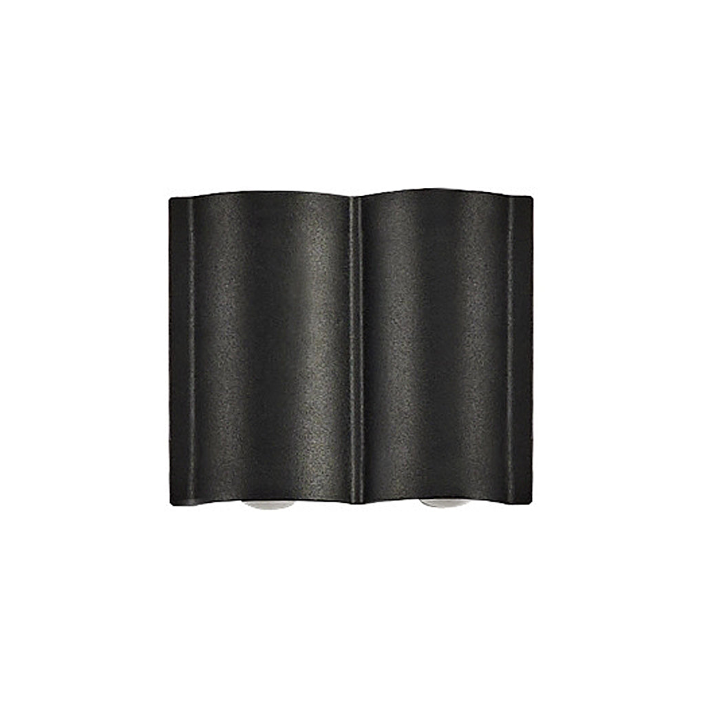 Pair of black up and down outdoor wall lights mounted on smooth white wall with focused lighting.