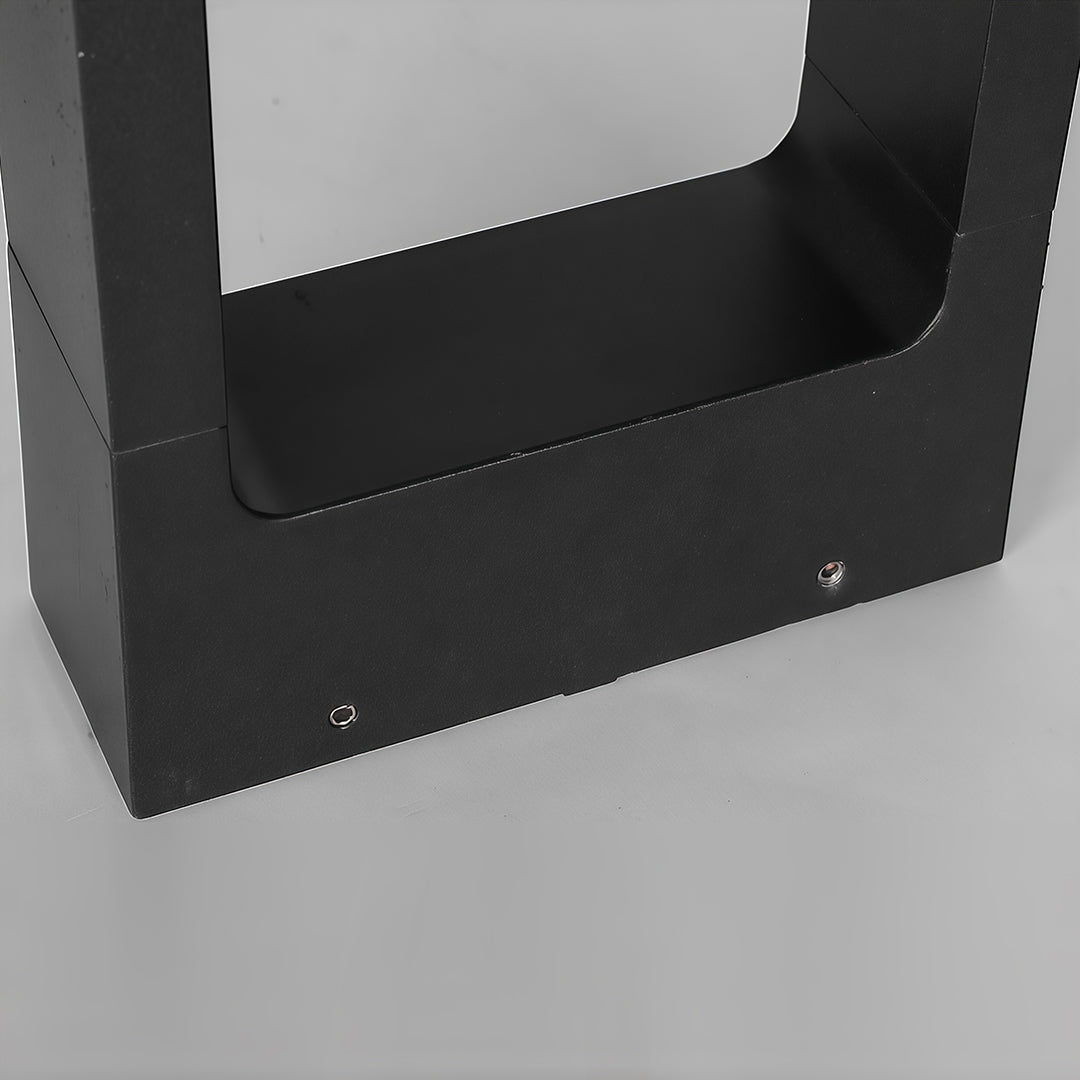 Enhance your outdoor walkways with pathway bollard lights featuring a minimalist black square outdoor light for modern and durable illumination.