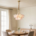 Pearl flower chandelier with elegant floral design, illuminating a classic dining room.