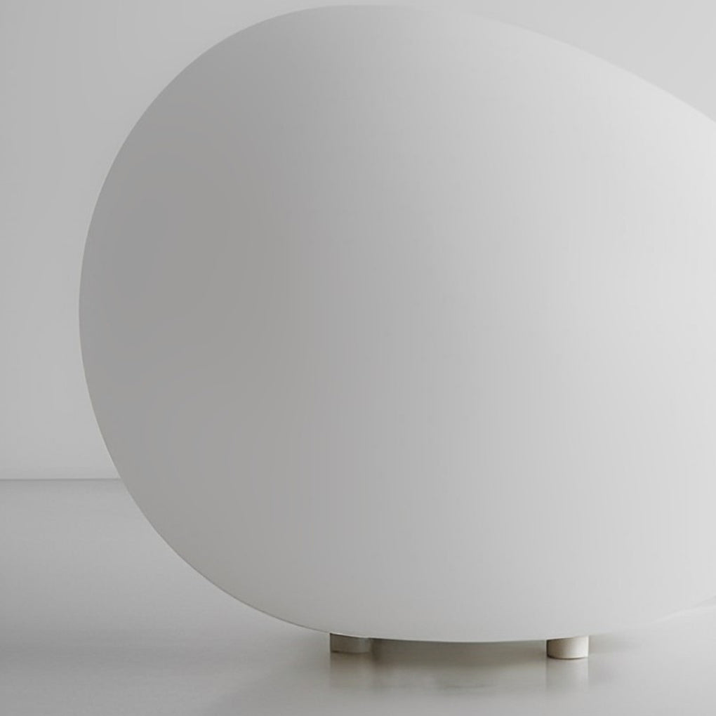 Pebble light with smooth surface and modern design.