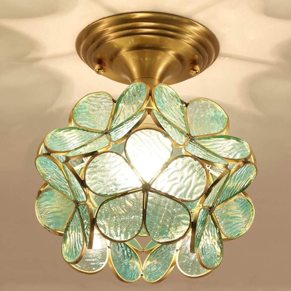 Petal shaped ceiling lights in green, close-up of the floral petals.