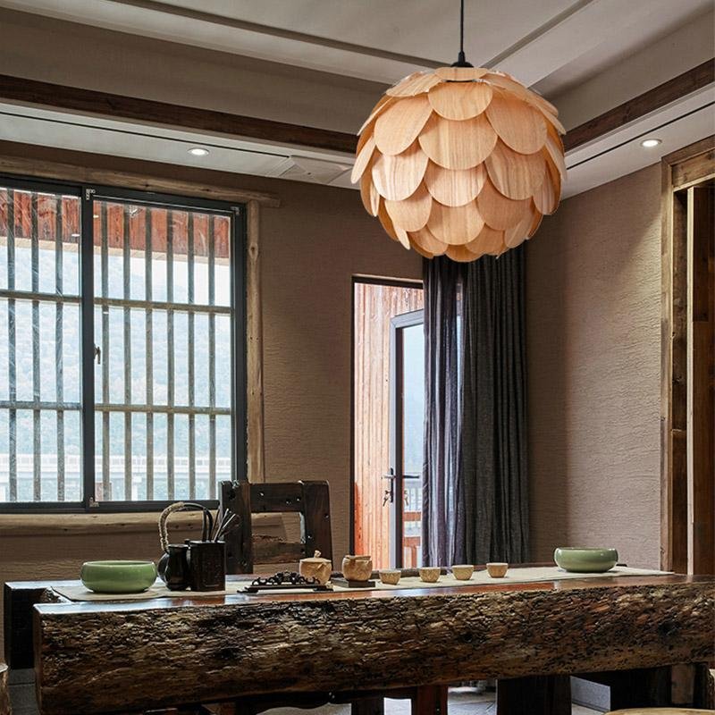 Pinecone pendant light with a natural finish, providing ambient lighting.