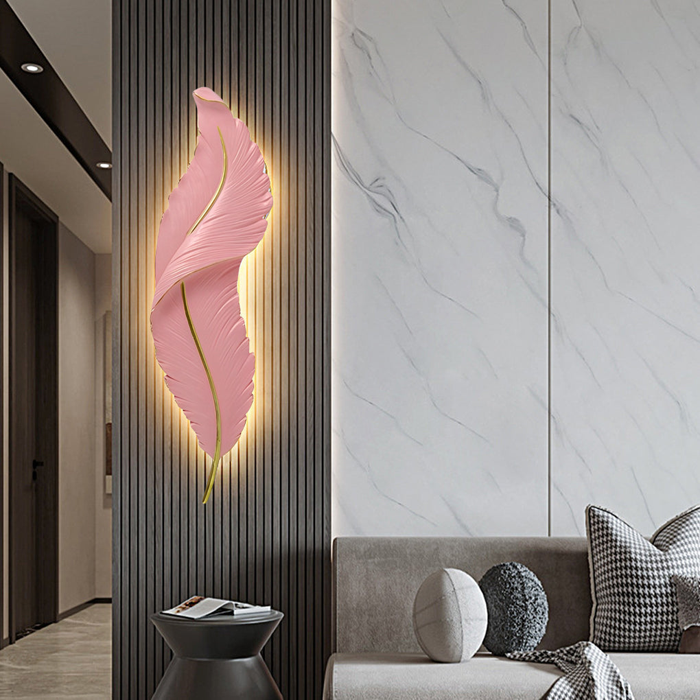 Pink feather wall light accenting modern interior with marble wall background.