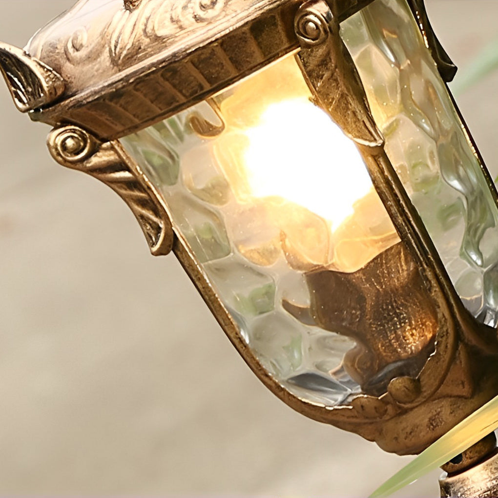 Poles for yard lights in bronze, front view of the classic design.