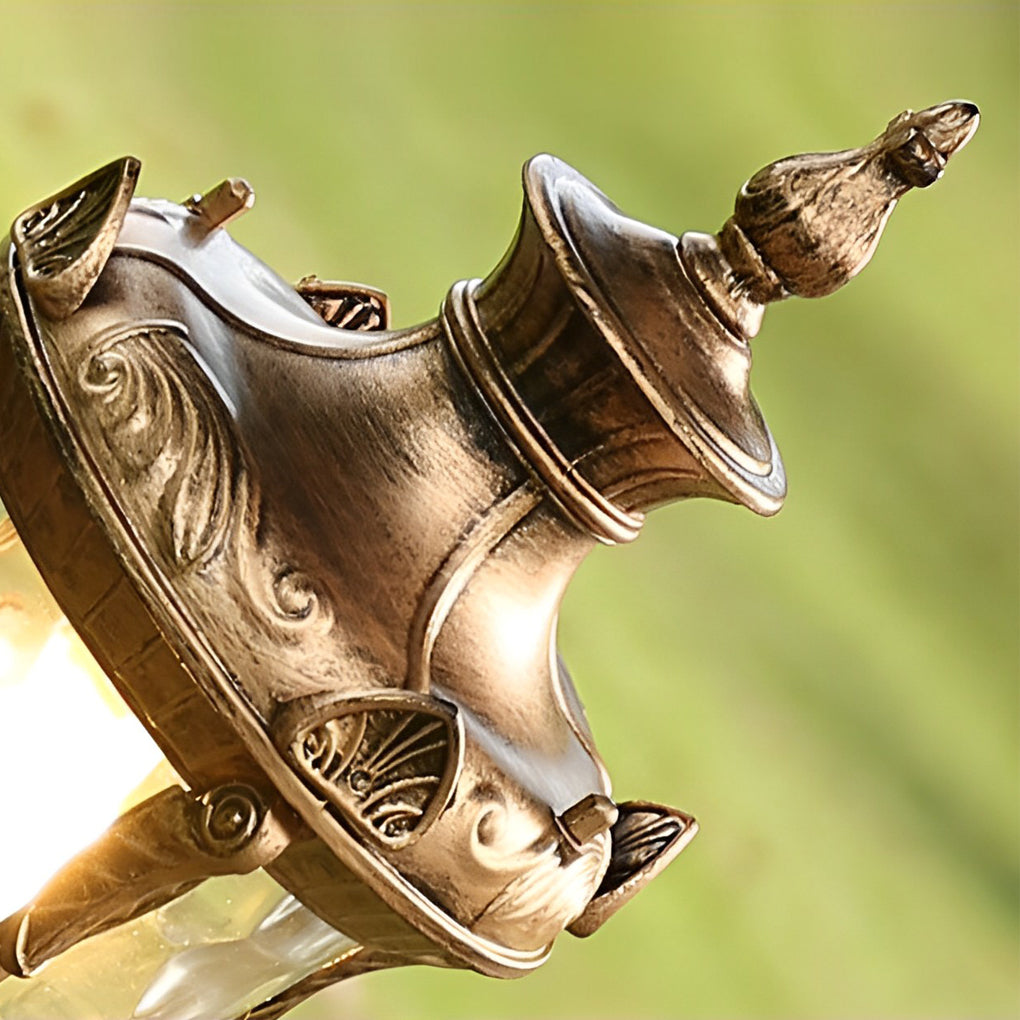 Poles for yard lights with a close-up of the decorative base.