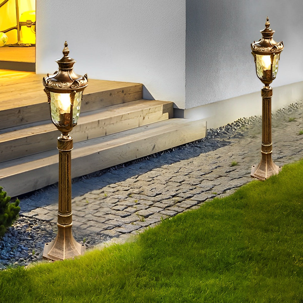 Poles for yard lights with a close-up of the ornate, vintage lantern design.