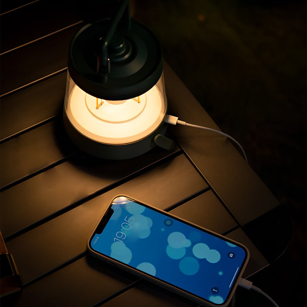 Portable rechargeable LED lamp with a close-up of its USB charging port.