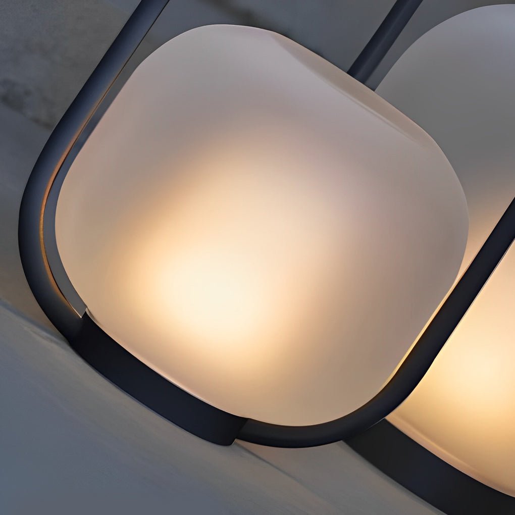 Close up of a portable solar lantern, highlighting its sleek design and solar panel top.