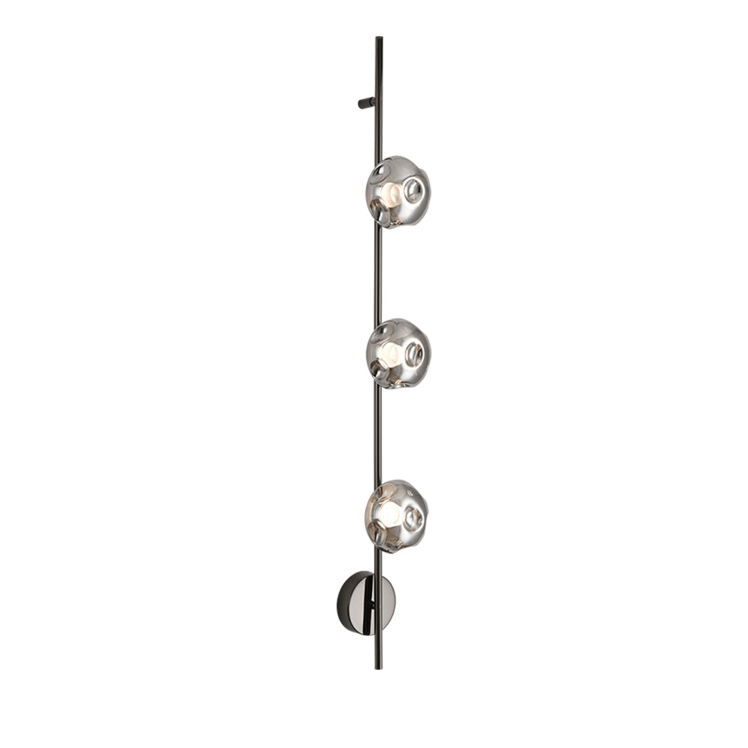 Premium indoor wall mounted lights installed in modern bedroom with vertical glass sphere arrangement