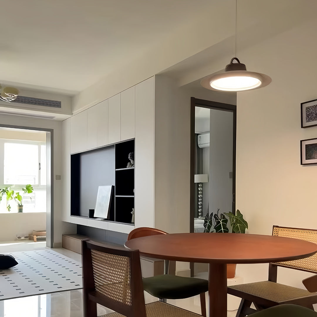 Premium single pendant lights for kitchen positioned over modern dining table in contemporary home