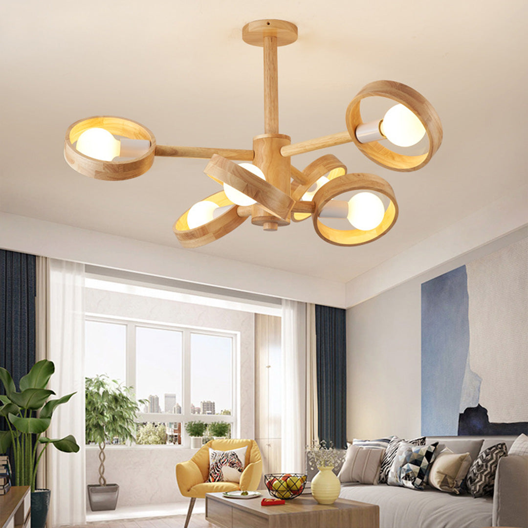 Professional installation of brass glass shade chandelier demonstrating wall light functionality
