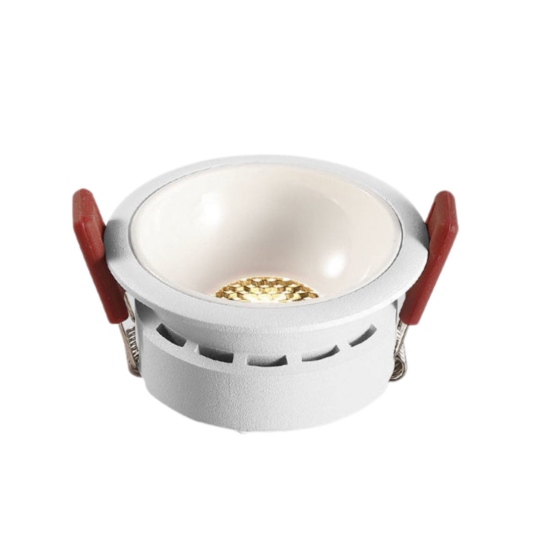 Clean white ceiling round led lights with minimalist recessed profile and warm light output