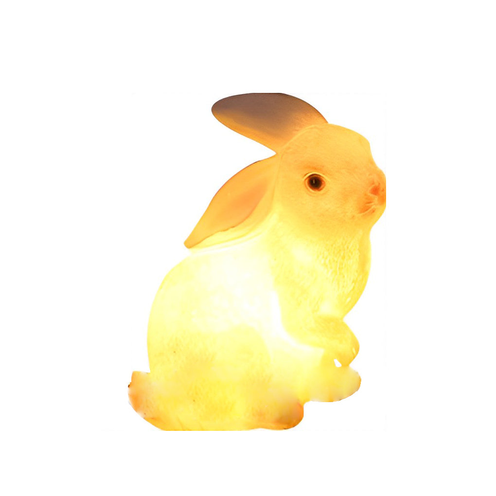 Rabbit garden light with a glowing effect, emphasizing its cute and simple design.