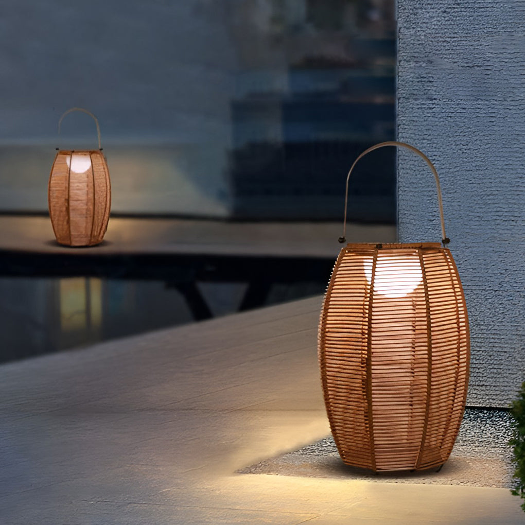 Rattan floor lantern with detailed view of its handle and structure.