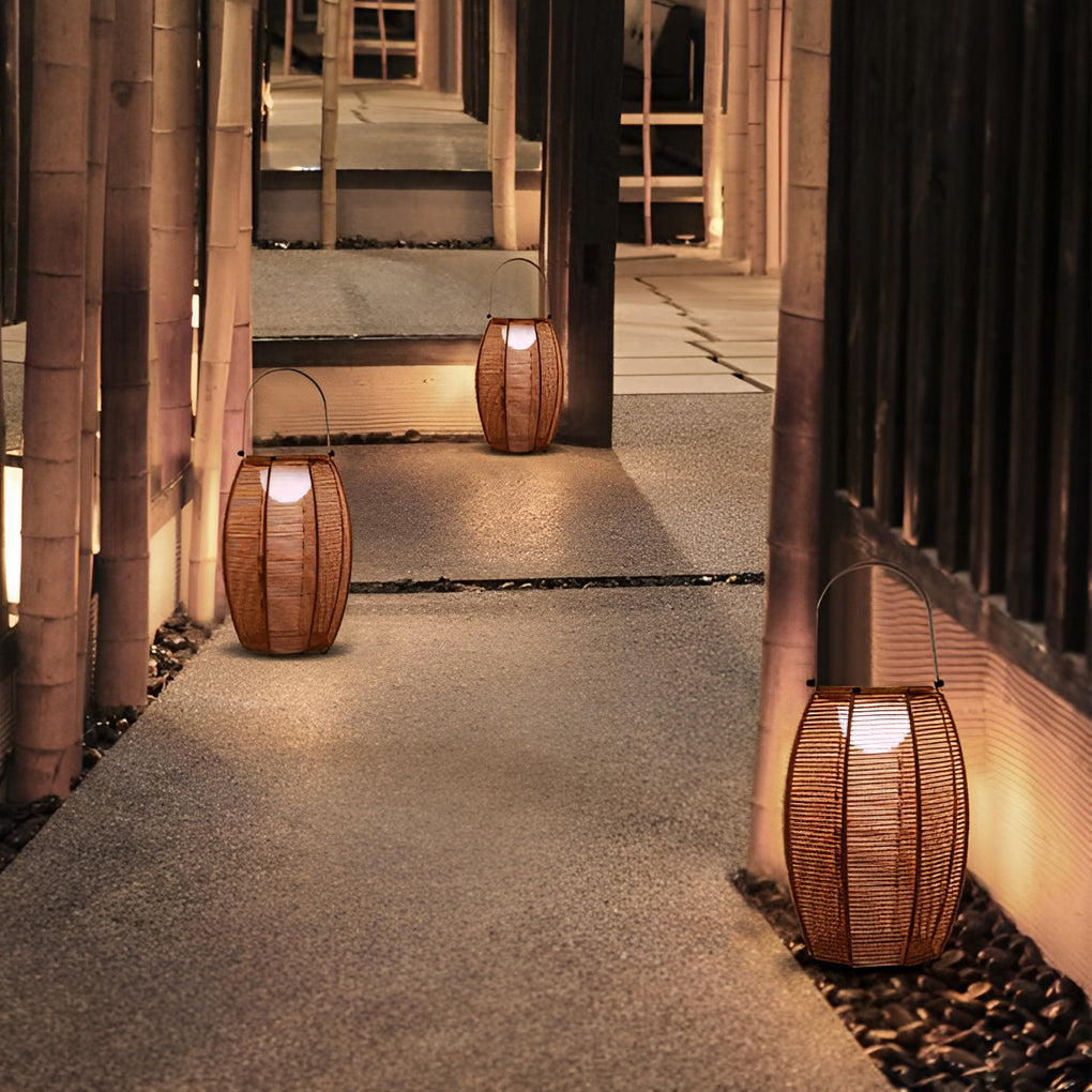 Rattan floor lantern enhancing a stylish outdoor corridor with ambient light.