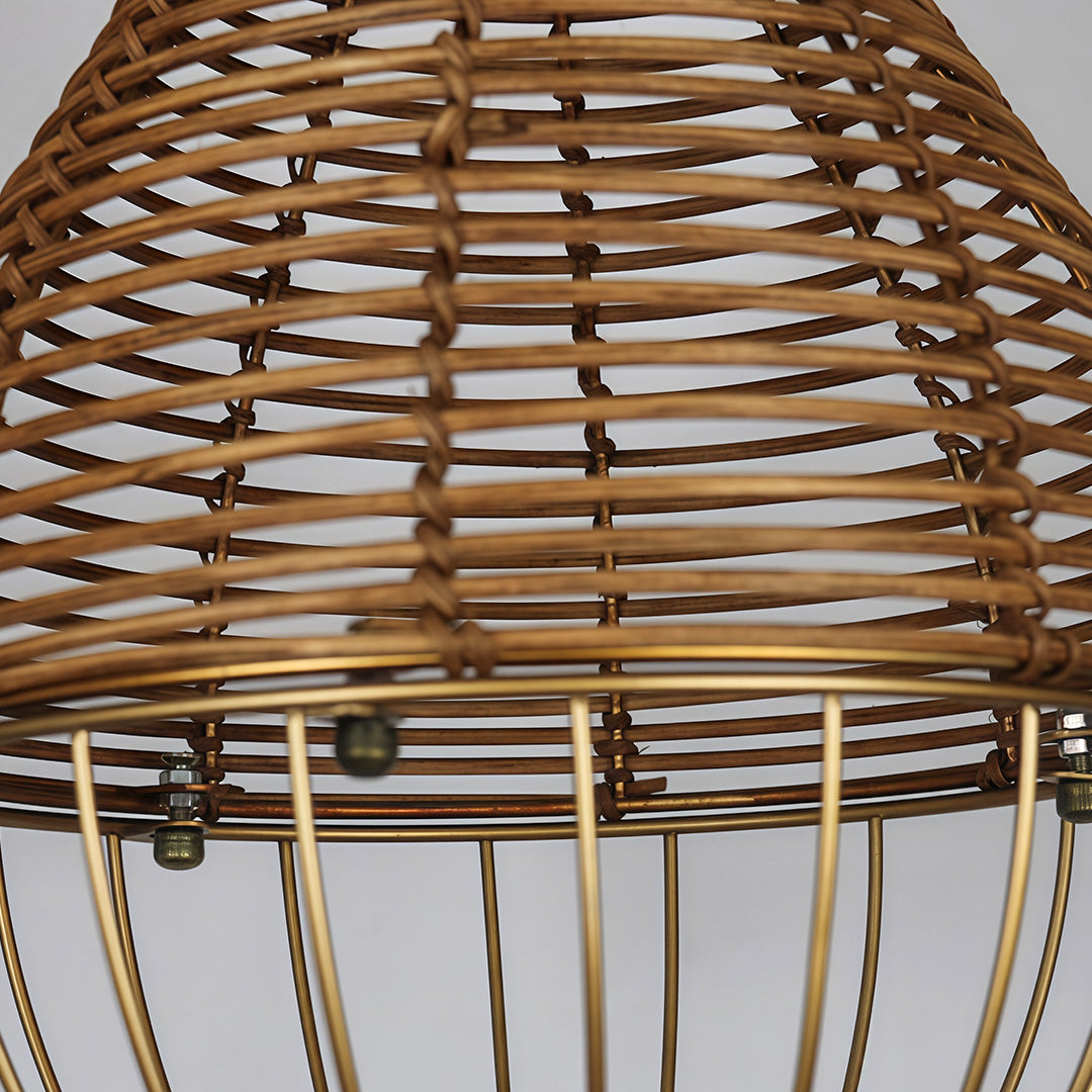 A rattan pendant light shade above a kitchen counter, blending rustic charm with modern function.