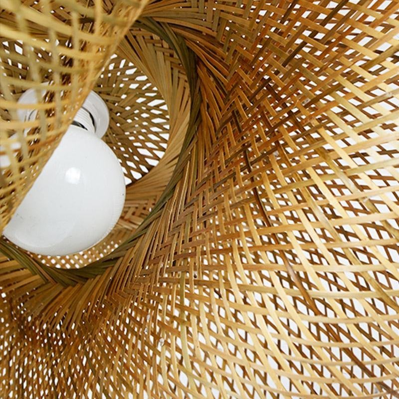 Rattan wave pendant light interior weave detail showing bulb placement.