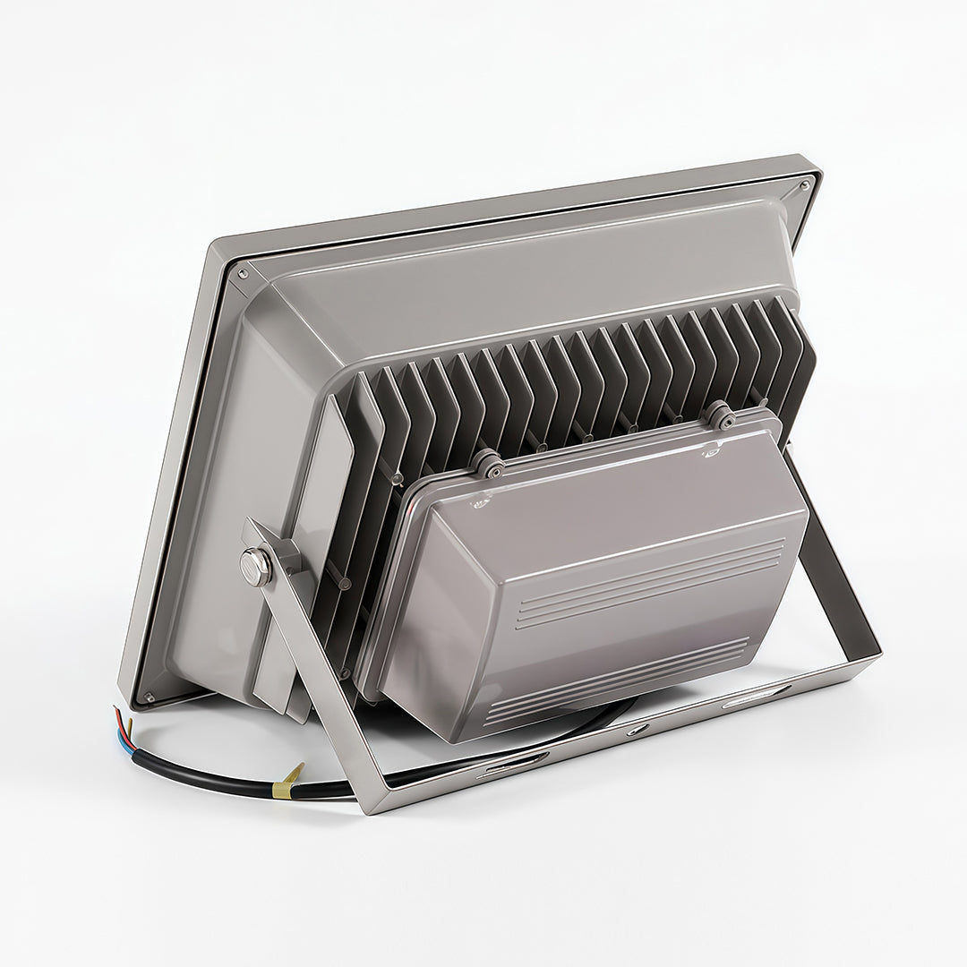 Rear view of a heavy-duty architectural flood lights fixture highlighting the large cooling fins and adjustable bracket.