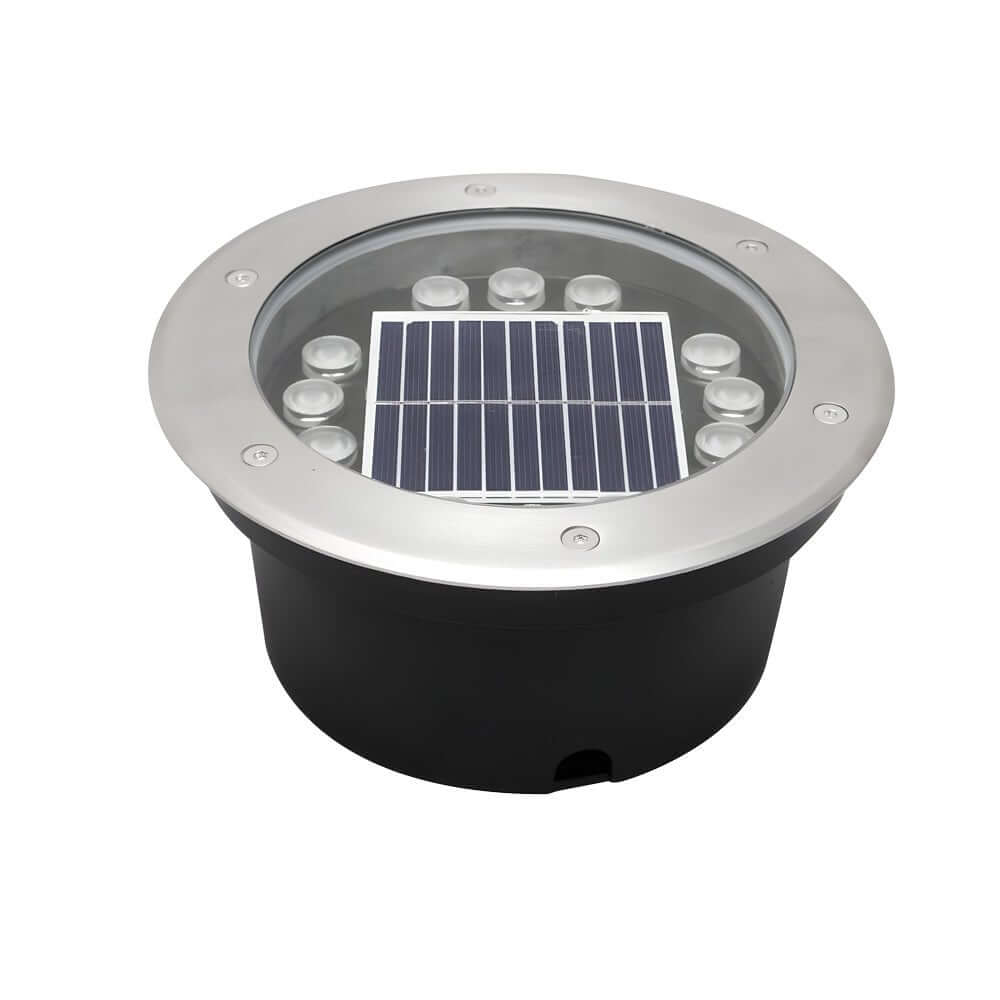 Recessed floor lighting in a brick-paved courtyard, adding charm and safety to outdoor spaces.