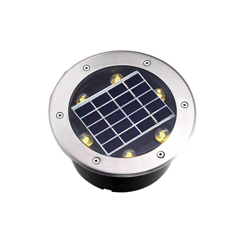 Recessed floor lighting in a pebble pathway, offering soft lighting for garden and landscape areas.