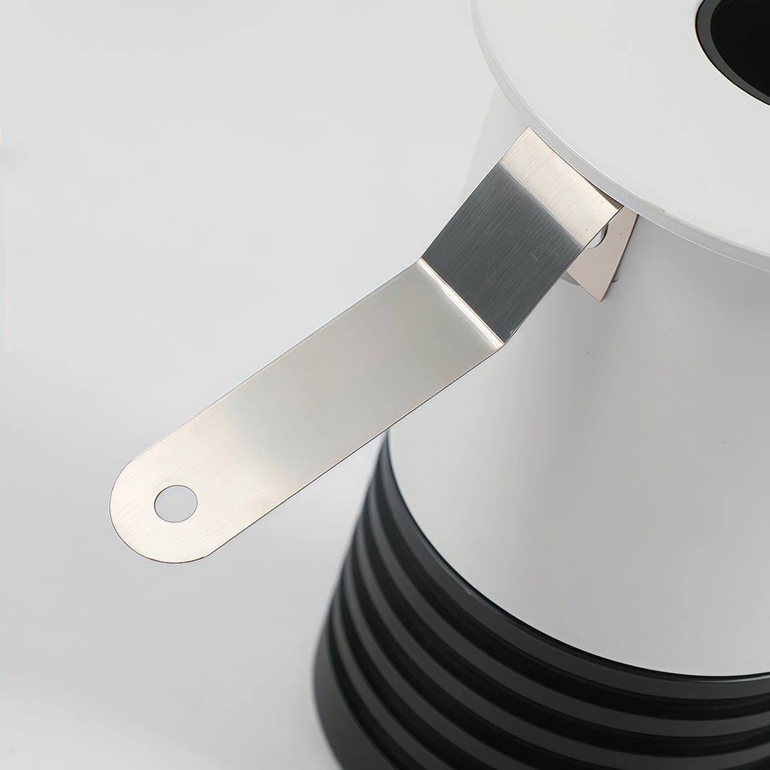 Close-up of recessed LED ceiling light mounting mechanism with directional adjustment capability.