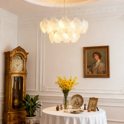 Rectangular artistic glass chandeliers with a gold frame, ideal for illuminating long dining tables.