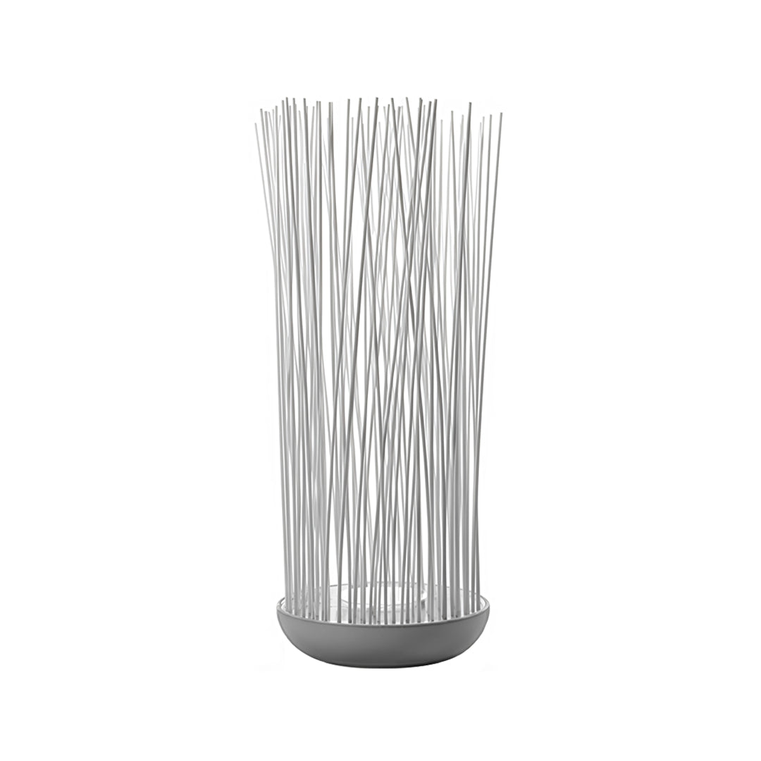 Reeds outdoor LED floor lamp featuring a modern cylindrical design with vertical reed-like structures for ambient lighting.