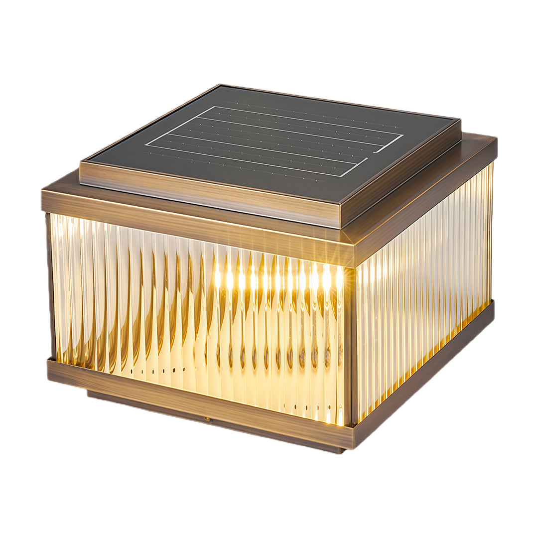 Modern copper pillar light featuring ribbed glass design with warm glow and contemporary dark metal top.