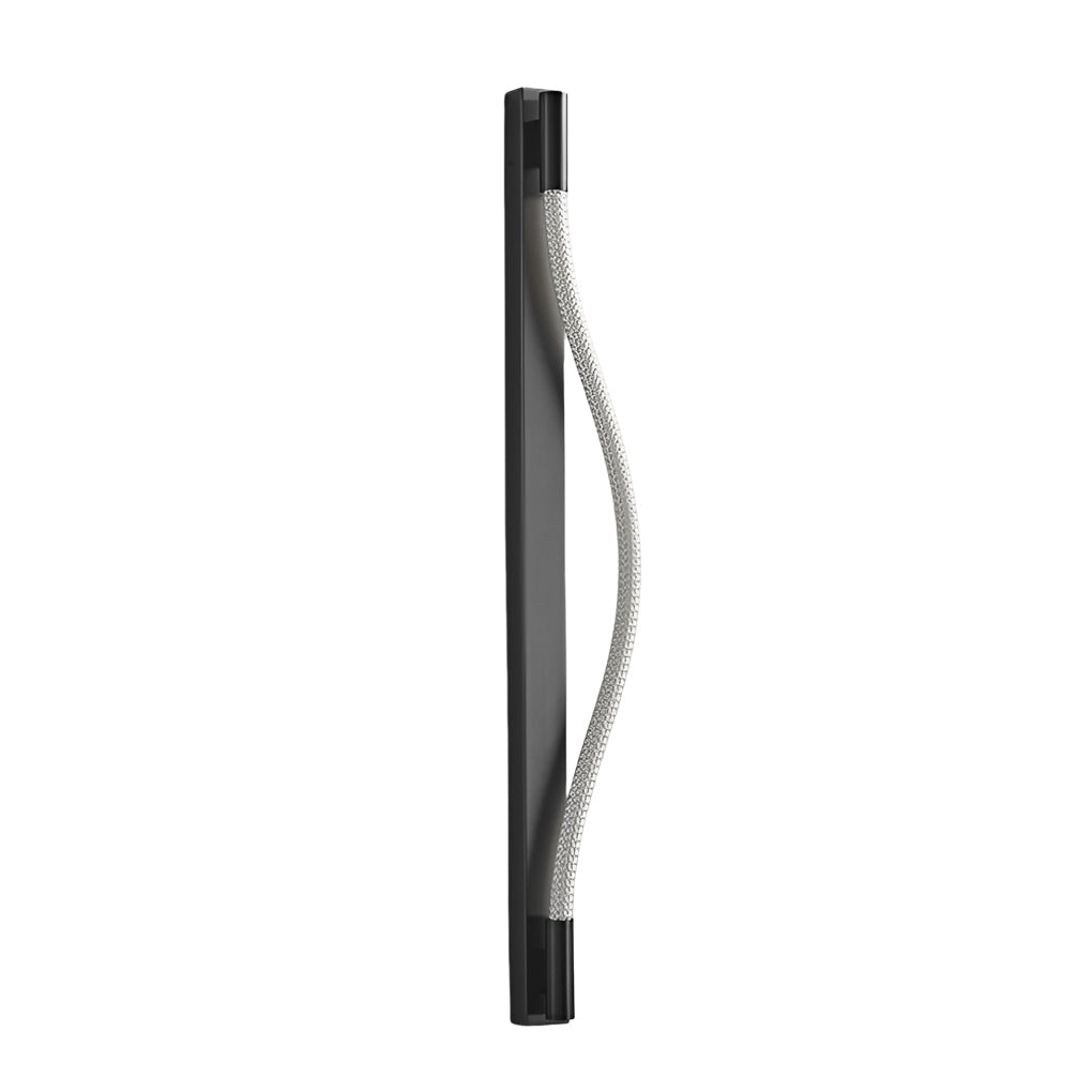 Rope wall sconce light with a modern design, providing soft illumination in a living room.