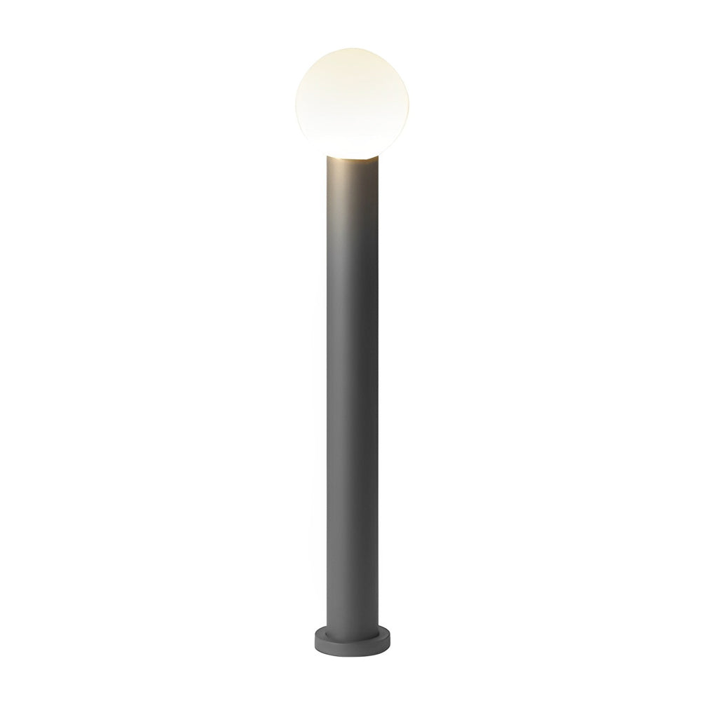 Round bollard lights with a close-up of their base and spherical head.