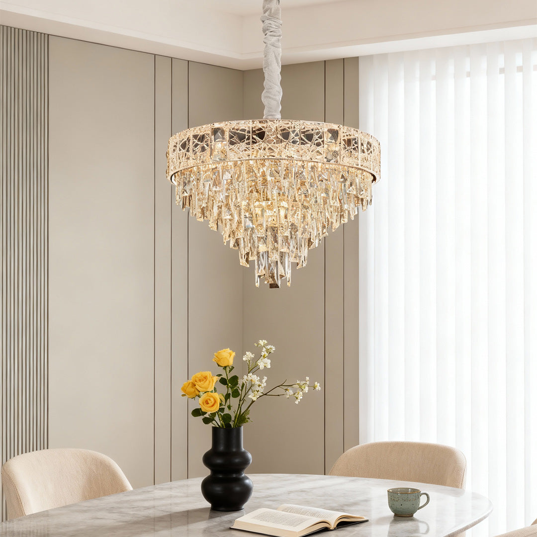 Warm beige dining space with elegant round large chandelier crystals centerpiece.