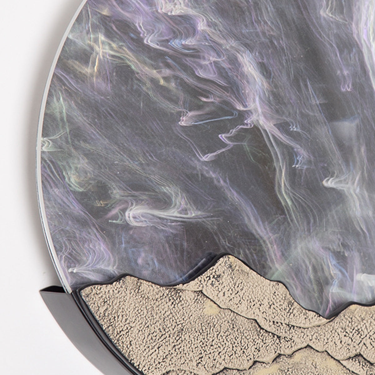 Round outdoor sconce showcasing its detailed texture and warm light.