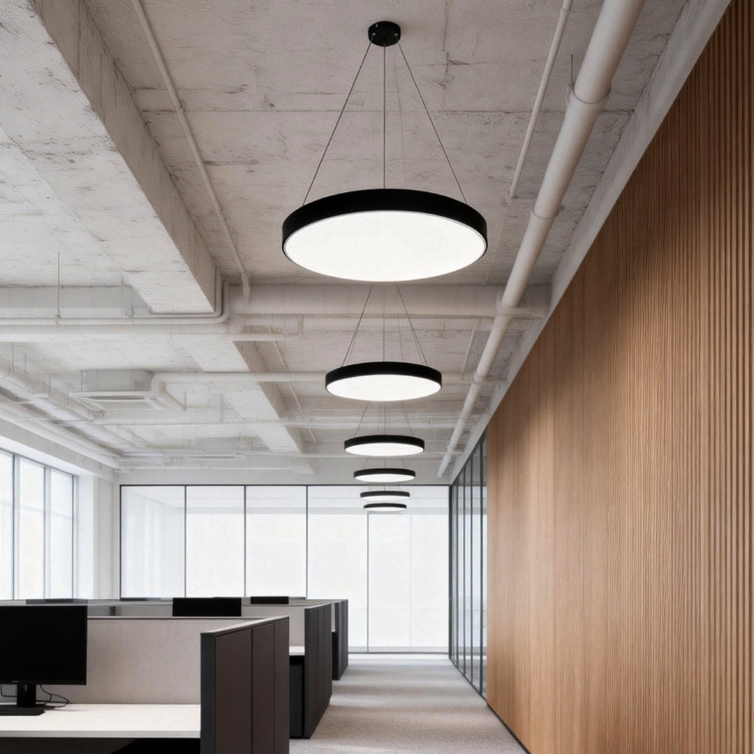 Minimalist hallway featuring round pendant lights aligned along a wooden accent wall.