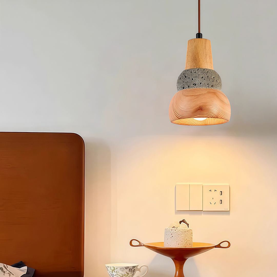 A rustic wood pendant lighting hanging elegantly above a kitchen island, offering a perfect blend of style and warmth.