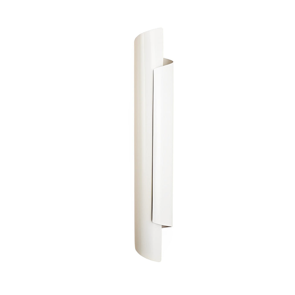 Scroll wall sconce with a gold finish, casting a soft glow in a modern living room with artwork.
