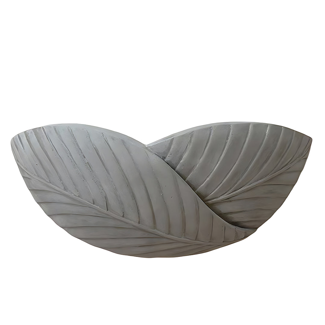 Sculptural night wall light with stacked stone appearance and warm downward illumination