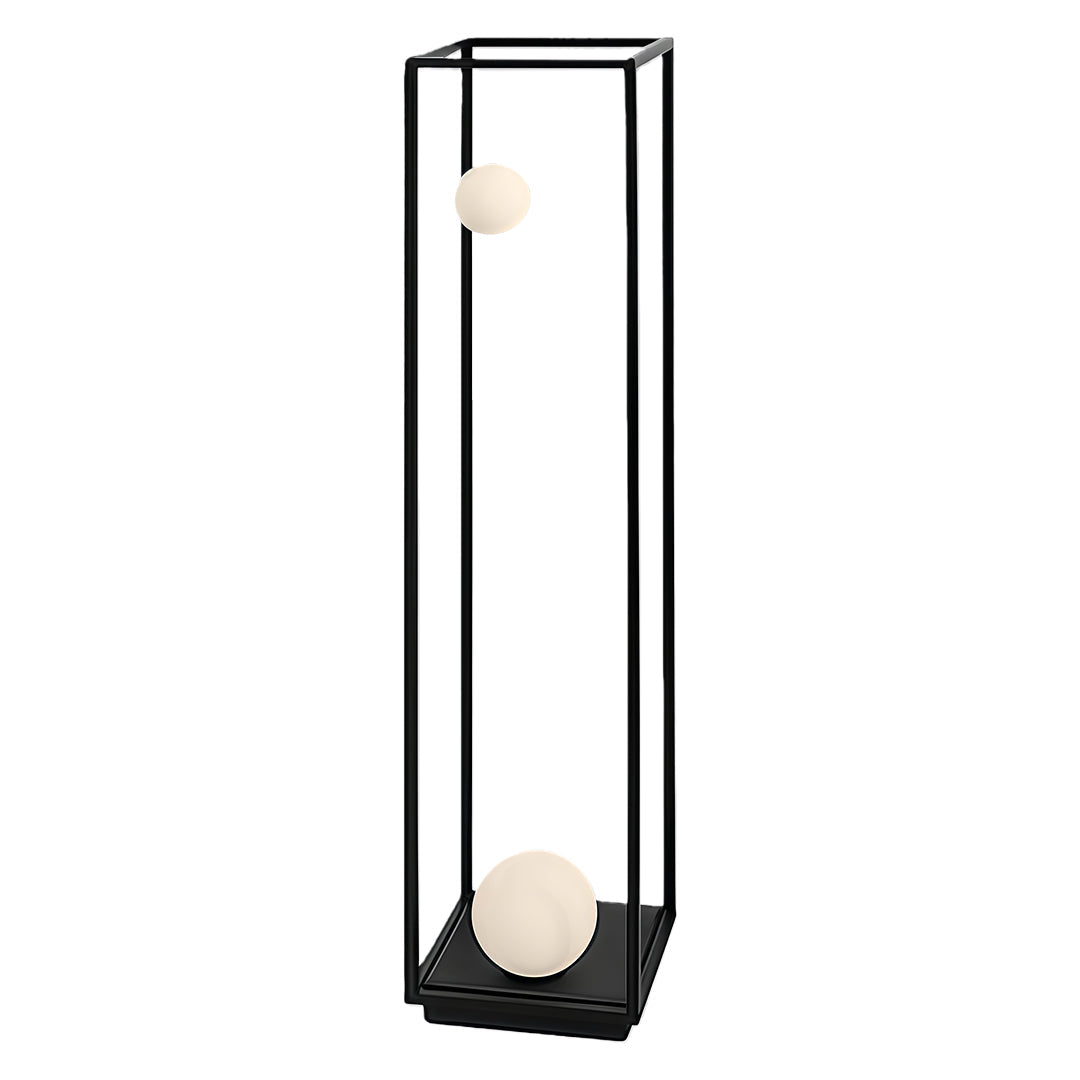 Set of bollard outdoor lights placed against a natural stone backdrop, offering both functionality and style.