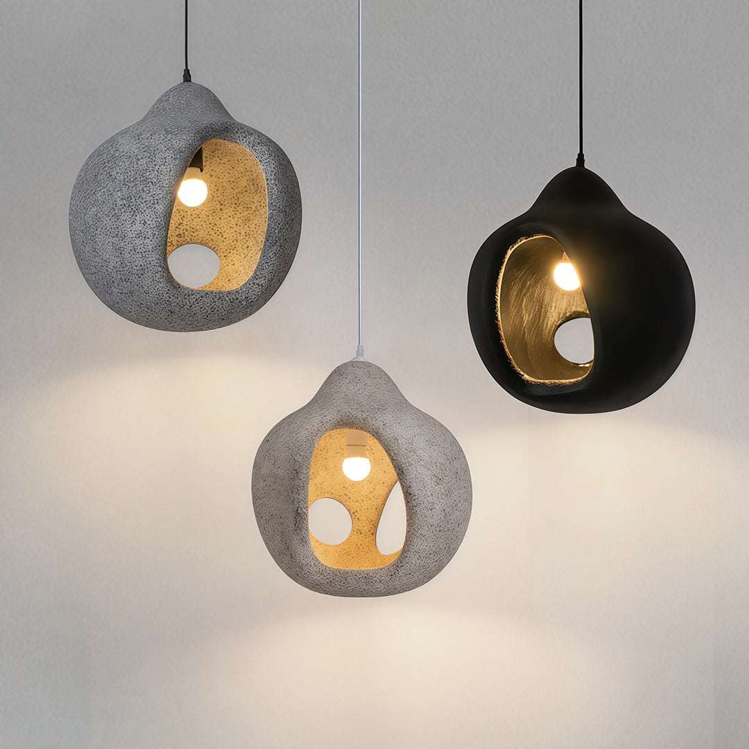 Set of Nordic wabi sabi pendant light in gray and black tones, creating soft ambient illumination.