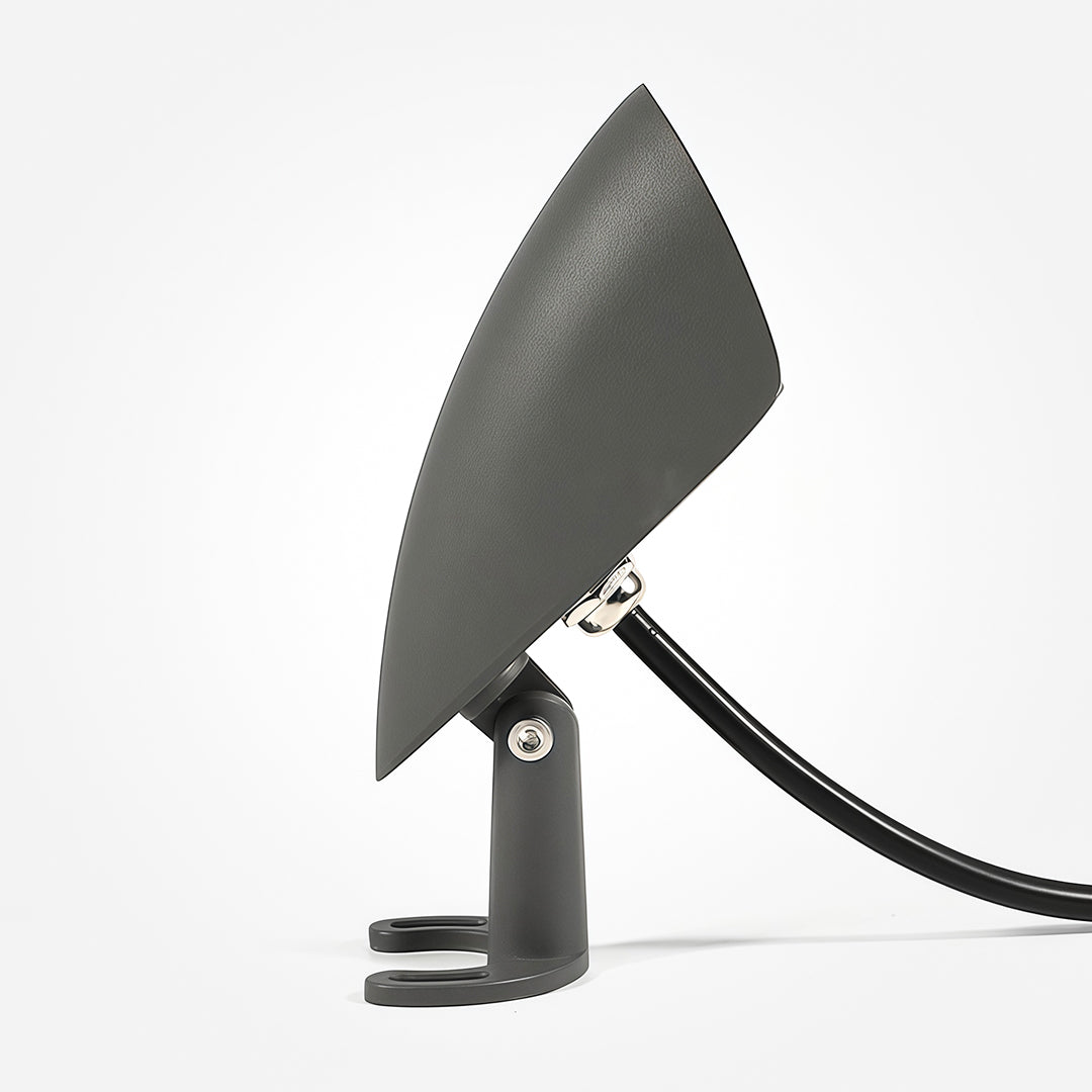 Side profile of decorative wall wash lighting with curved top cover.