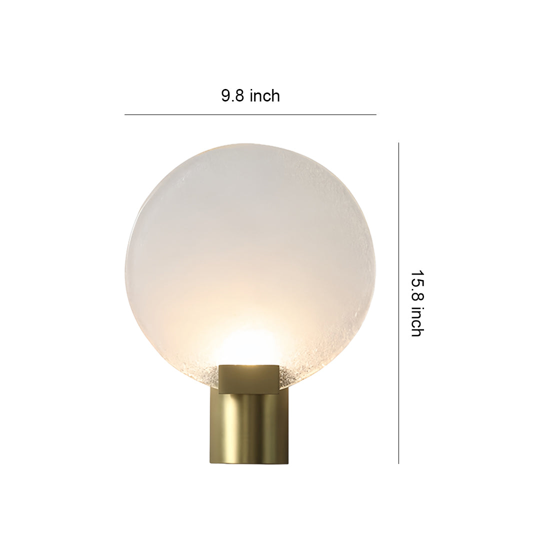 Side view of a round wall light with a frosted glass shade, highlighting the gold base and cylindrical shape.