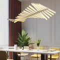 Sleek black art pendants light fixture creating a focal point in a modern dining area.
