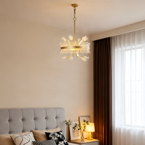 Modern gold blossom chandelier with crystal details in a chic dining room